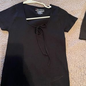 black crop top with whole near top